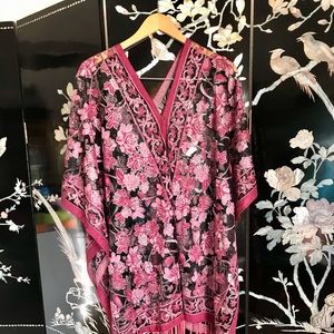 Sheer black with pink outlined in silver poncho